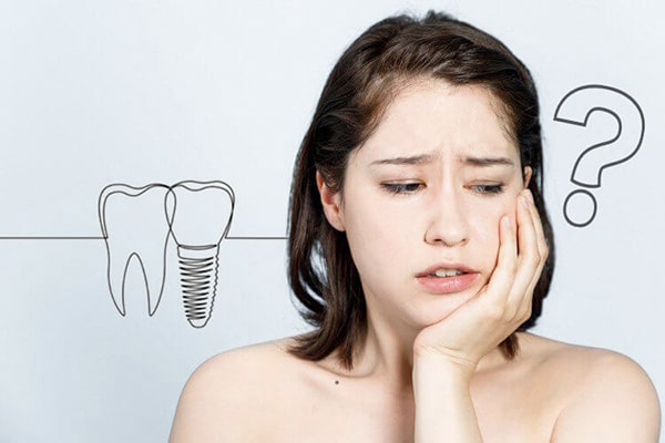 Trong quá trình trồng răng Implant có đau không?